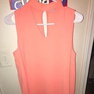 Women’s size medium sleeveless top. NWOT!